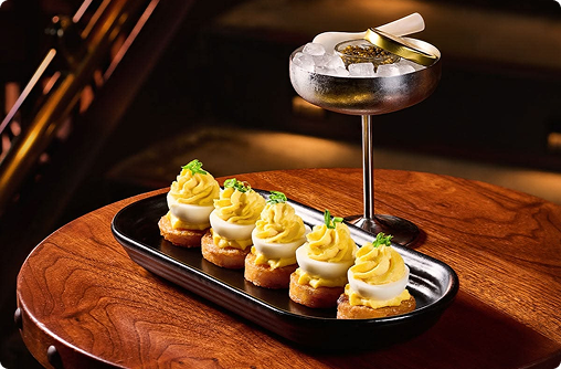 Signature canapés and bespoke cocktails  crafted to be photographable and shareable.