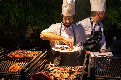 Chef-led at-home service: full kitchen setup,  live cooking, professional teardown.